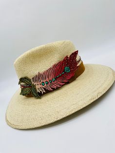 Handmade by artisans in Mexico, this new 100% baked palm leaf hat is perfect for the summer soirees you've been dreaming of. Featuring a fedora crown and tightly woven pressed palm, this hat is imagination brought to life. High quality leather handmade decoration  S/M suitable for 54 cm - 57 cm. Leaf Hat, Leather Accessory, Summer Soiree, Fedora Hat, Palm Leaf, Handmade Decorations, Leather Accessories, You've Been, High Quality Leather