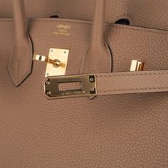 Hermes Birkin 25 bag featured in warm Chai. This neutral Hermes Birkin is the all time perfect neutral statement.Softer and creamier than Gold, this fabulous colour moves easily with any piece in your wardrobe. Lush Togo leather is supple and scratch resistant. Rich with gold hardware.Comes with lock, keys, clochette, sleepers, raincoat, signature Hermes box and ribbon.Mightychic has excelled in customer service for 22 years and provides a discreet online shopping experience for beautiful Hermes selections.final sale BAG MEASURES:LENGTH 25 cm / 9.25" TALL 18.5 cm/ 7.25"DEEP 13 cm / 5.25"HANDLES:TALL 3"CONDITION:NEW OR NEVER TIDS 'n BITSThe Hermes Birkin 25 bag price maintains its value due to the rarity and high demand.This small version of the Birkin is deceptive, as it holds far more of Hermes Birkin 25, Hermes Box, Togo Leather, Birkin 25, Hermes Bags, Everyday Items, Hermes Birkin, High Quality Leather, All Time