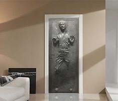 a door with an image of jesus on it in the middle of a living room