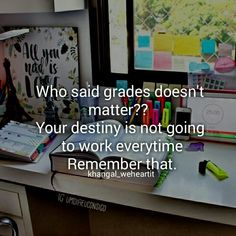 a desk with some writing on it and a quote about what is in the background