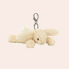 A mini bunny stuffed animal on a silver keychain. Jelly Cat Keychain, Jellycat Keychain, Stuffed Keychain, Y2k Items, Plush Keychains, Jelly Cat, Wishlist Ideas, Xmas Wishlist, Holiday Wishlist