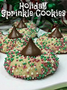 holiday sprinkle cookies on a white plate