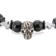 The Courage Onyx Skull Bracelet is not only a stylish accessory, but also a meaningful piece of jewelry that carries symbolic significance.  At the center of the bracelet sits a sterling silver skull bead, which serves as a powerful symbol of transformation and change. The intricately crafted skull bead is made from high-quality sterling silver, giving it a lustrous and luxurious look. The skull bead adds a touch of edginess to the bracelet, representing the courage to face mortality and embrace Black Edgy Bracelets As Gift, Black Gothic Jewelry With 8mm Beads, Symbolic Black Metal Bracelets, Black Symbolic Metal Bracelet, Symbolic Black Metal Bracelet, Black Symbolic Jewelry With 8mm Beads, Black Symbolic Bracelet Jewelry, Symbolic Black Bracelet Jewelry, Black Skull Stainless Steel Jewelry