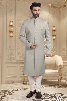 Introducing our latest masterpiece, the Mens Sherwani R14-S65. Made with a delicate pastel color, this sherwani exudes elegance and sophistication. Perfect for special occasions and formal events, this sherwani with unique design make you stand out in the crowd and elevate your style to a whole new level. Designer Formal Traditional Wear With Chikankari Embroidery, Designer Traditional Wear With Chikankari Embroidery For Formal Occasions, Designer Chikankari Embroidery Formal Traditional Wear, Designer Chikankari Embroidery Traditional Wear For Formal Occasions, Elegant Bandhgala With Resham Embroidery For Diwali, Elegant Traditional Wear With Naqshi, Elegant Suits With Dabka For Diwali, Elegant Traditional Wear With Naqshi Drape, Elegant Traditional Wear With Naqshi In Traditional Drape