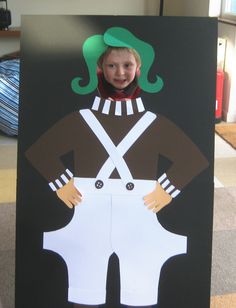 a cardboard cut out of a child's costume