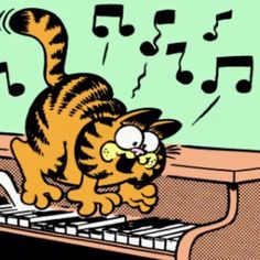 a cat that is standing on top of a keyboard and has music notes coming out of it