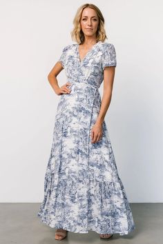 Elevate your wardrobe with our Dulce Wrap Maxi Dress in White + Blue Print, designed for effortless elegance. Embrace the season's festivities in style with this versatile piece, perfect for any spring occasion. Fitted Gowns, Maxi Dress White, Baltic Born, Wrap Maxi Dress, Mob Dresses, Glamorous Dresses, Short Sleeve Maxi Dresses, Sequin Gown, Maid Dress