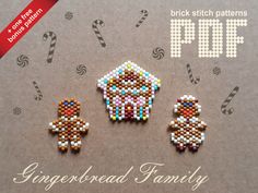 three beaded gingerbread family brooches sitting next to each other