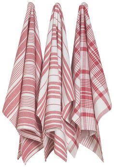 three red and white checkered towels hanging from the side of a rack on a wall