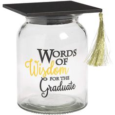 a graduation cap on top of a glass jar with the words words of vision for the graduate