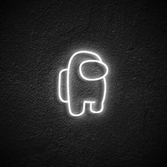 an elephant neon sign on the wall in a dark room with no one around it