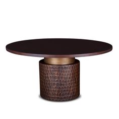 a round table with a metal base and black top