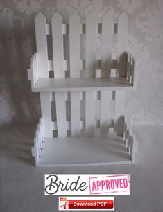 the bride approved sign is displayed in front of a white wallpapered room with two shelves