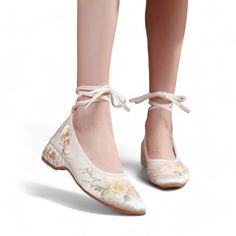 ❁Embrace Timeless Elegance and Comfort: White Lace-Up Ballet Flats with Delicate Florals Unveil a fusion of classic style and breathable comfort with our stunning white lace-up ballet flats featuring delicate floral embroidery!  These exquisite shoes are meticulously crafted to elevate your everyday look while keeping your feet cool and happy. ❁Crafted with Love and Attention to Detail: ⋆Silky Smooth Exterior Material: Luxurious fabric offers a touch of sophistication. ⋆Delicate Floral Embroider Spring Wedding Shoes With Low Heel, Beige Round Toe Wedding Shoes For Spring, Summer Ceremony Heels With Round Toe, Spring Formal Wedding Shoes Lace-up, Spring Ceremony Closed Toe Heels, Spring Wedding Shoes With Round Toe, Closed Toe Heels For Summer Ceremonies, Closed Toe Heels For Ceremony In Summer, Beige Closed Toe Wedding Shoes For Spring