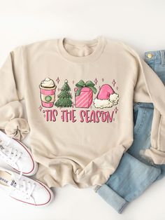 Collect yourself in the most fashionable way possible this season! Nothing says bring on Fall and Winter like fun graphic sweatshirts! Pair this with your favorite high waisted jeans and booties for a Fall worthy look! Details: Sizing: Small (4/6) | Medium (8/10) | Large (12/14) | XL (14/16) Tickled Teal brand sweatshirts comparable to Gildan 18000 fit. PROCESSING TIME: 5-7 business days **NOTE** If ordered with non-custom items, order will be held to ship with graphic tees. Christmas Sweatshirt Ideas, Teal Branding, Maxi Skirt Dress, Holiday Sweatshirt, Graphic Apparel, Branded Sweatshirts, Workout Sweatshirt, Romper Pants, Knee Length Skirt