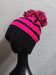 Neon pink & black crochet beanie with removable pompom. Message me for orders with colors. Black Acrylic Yarn Beanie Cap, Black Acrylic Yarn Beanie, Black Yarn Crochet Beanie Hat, Black Crochet Hat In Acrylic Yarn, Black Acrylic Yarn Crochet Hat, One Size, Black Crochet Yarn Beanie, Black Crochet Cap Made Of Acrylic Yarn, Warm Black Crochet Hat In Acrylic Yarn, Warm Pink Crochet Hat