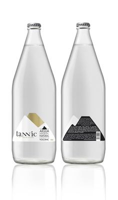 two bottles of tonic water on a white background