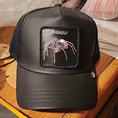 100% Authentic Goorin Bros. Trucker Limited Edition Original (First) Friday Drop The Farm Collection Deadly Encounter Black Widow Leather-Like Reptile Pattern Upgraded Sweatband Inside Of Cap Brand New Never Worn Displayed Only Tags Removed For Display Comes With Hologram, All Original Inserts And Sales Invoice Had Intentions Of Wearing My Collection, But Only Wore A Few So Am Selling My Collection. My S/H Is Always Delayed So Pls. Msg. Me B4 U Buy If Ur In A Hurry. Reptile Pattern, Goorin Bros, First Friday, In A Hurry, Black Widow, The Farm, My Collection, New Color, Black And Red