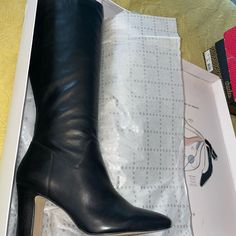 Brand New Never Worn Heeled Boots With 4-inch Heel For Work, Elegant Tall Boots With Block Heel, Chic Boots With 4-inch Heel For Workwear, Office Heeled Boots With Medium Width, Chic Business Boots With 4-inch Heel, Medium Width High Heeled Boots For Office, Office Heeled Boots With 4-inch Heel And Round Toe, Chic High Heel Boots With Leather Sole, Chic High Heeled Boots With Leather Sole