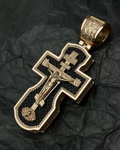 Celebrate your faith with our 585 gold Ebony cross pendant, featuring revered icons of St. Nicholas, Archangel Michael, Archangel Gabriel, and St. Basil the Great. This exquisite Orthodox Christian jewelry piece combines rich gold craftsmanship with deeply spiritual imagery, making it a meaningful addition to any collection. Perfect for those seeking a blend of tradition and elegance, this pendant serves as a beautiful symbol of devotion and protection. FEATURES: -High-Quality 585 gold : Crafted St Basil The Great, Orthodox Jewelry, Michael Archangel, Orthodox Cross, Archangel Gabriel, Beautiful Symbols, Archangel Michael, St Nicholas, Christian Jewelry