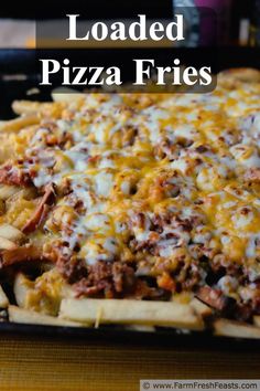 loaded pizza fries with cheese and meat on top