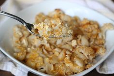 a white bowl filled with macaroni and cheese