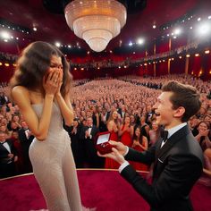 a man in a tuxedo is giving an award to a woman