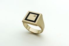 "Signet gold ring for men and women with a diamond, geometric gold, and black enamel pinky ring, available in solid 18k/ 14k Yellow, Rose, or White Gold. This elegant signet ring features a flat square top with a black enamel inner frame and is inlaid with a single shiny diamond at one corner. The band is made of solid 14k or 18k yellow, rose, or white gold - select your preferred combination from the selection menu. This original signet ring is made with lots of passion, love, and great attenti Black And Gold Ring, Statement Gold Ring, Gold Ring For Men, Signet Ring For Men, 14k Gold Wedding Band, Diamond Signet Ring, Antique Wedding Rings, Square Top, Gold Statement Ring