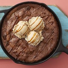 chocolate cake with ice cream in a cast iron skillet