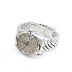 Released in 1945, the Datejust is Rolex’s longest standing collection and was created to commemorate the company's 40th anniversary. Unlike other Rolex watches, the Datejust was not designed for a specific activity or environment and simply exists as a smart, reliable timepiece. Pioneering for its time, the Datejust was the first self-winding watch to feature a date display window and also the first Rolex watch to use the Jubilee bracelet design. Combined with the tried and true Oyster case, the Monochrome Watches, Time And Tide, Watch Review, Rolex Watch, Bracelet Design, Pre Owned Rolex, Tried And True, 40th Anniversary, Krakow