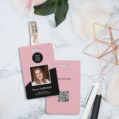 a pink id card with a photo on it