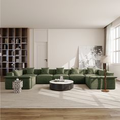 a living room filled with green couches next to a white table and bookshelves