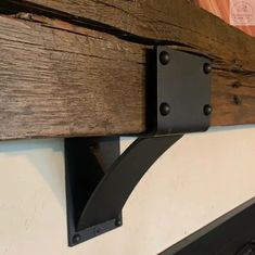 The Mottville Shelf Bracket Brackets/Corbels 6 Depth x 6 Wall Mount Length Finish Raw - Uncoated Metal | Industrial Farm Co Mantel Corbels, Farmhouse Mantel, Steel Shelf Brackets, Shelving Brackets, Wooden Mantel, Rustic Mantel, Metal Shelf Brackets, Mantel Shelf, Shelf Bracket