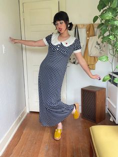 1970s nylon polka dot maxi dress with the cutest rounded collar and a lil rose applique. Obsessed!  PTP 17-21" Empire waist 14.5-17.5" Natural waist 18.5" + stretch  Hips 24" + stretch  Length 56" Full Length Fitted Retro Dress, Retro Full-length Fitted Dress, Retro Fitted Full-length Dress, Polka Dot Fashion, Retro Fitted Maxi Vintage Dress, Fitted Retro Maxi Vintage Dress, Fitted Retro Maxi Length Vintage Dress, Retro Polka Dot Day Dresses, Retro Polka Dot Dress For Daywear