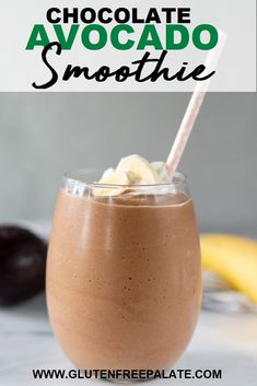 chocolate avocado smoothie in a glass with a straw