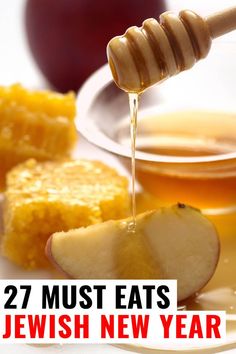 honey and apple slices on a plate with the words 27 must eats jewish new year