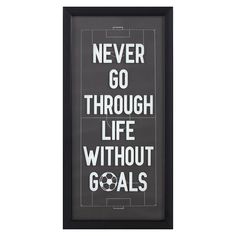 a framed poster with the words never go through life without goals in white and black