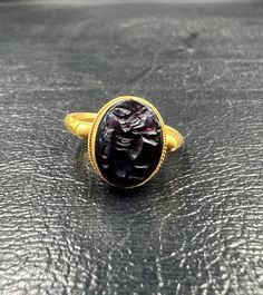 Ancient garnet with 18k gold seal ring Formal Gold Cabochon Signet Ring, Yellow Gold Garnet Signet Ring With Gemstone, Gold Ruby Signet Ring With Polished Finish, Antique Yellow Gold Ruby Ring With Polished Finish, Elegant Garnet Signet Ring For Formal Occasions, Luxury Engraved Ruby Ring, Antique Hallmarked Ruby Signet Ring, Classic Garnet Signet Ring For Formal Occasions, Yellow Gold Ruby Signet Ring Hallmarked