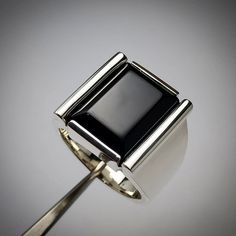 Welcome To JEWELRYSCAPEBoutique All OUR GEMSTONES ARE NATURAL NOT LAB CREATED  ALL OUR JEWELRY IS HANDCRAFTED IN THE INDIA.  Center Stone : Black Onyx Size:12×16MM EMERERALD CUT Material :Sterling Silver Finish With Rhodium. Luxury Men's Onyx Ring With Polished Finish, Silver Onyx Signet Ring With Polished Finish, Mens Silver Rings, Men's Ring, Silver Man, Anniversary Ring, Black Onyx, Anniversary Rings, Rings Statement