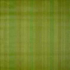 a green rug with vertical stripes on it