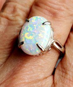 Wonderful Ehite Opal Ring, 12x16mm Favorite Lab Created Opal With Rainbow Fire, See Video! Lots Of Pink! 925 Sterling Silver Scroll Design Cathedral Setting, Rhodium Plated, Velvet Ring Box. Great Gift! Bright Necklace, Cathedral Setting, White Opal Ring, Velvet Ring Box, Rainbow Fire, Fire Opal Ring, Scroll Design, Rocks And Gems, White Band