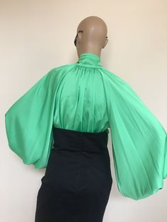 "This is a very stylish Womens Silk blouse. It is comfortable and cozy. Made for a free flowing fit. Great for all year around and for any special occasion or casual day can be dressed up or dressed down. SIZE CHART SIZE S - US 6, UK 8, EU 36 bust: bust around 34.5\"/90cm Waist: waist around 27.5\"/70cm Hips: hips around 34.5\"/90cm SIZE M - US 8, UK 10, EU 38 bust: bust around 37.5\"/95cm Waist: waist around 29.5\"/75cm Hips: hips around 37.5\"/95cm SIZE L - US 10, UK 12, EU 40 bust: bust aroun Silk Long Sleeve Blouse For Evening, Spring Evening Blouse With Lantern Sleeves, Chic Party Tops With Balloon Sleeves, Chic Balloon Sleeve Party Tops, Chic Balloon Sleeve Blouse For Party, Spring Satin Blouse For Workwear, Elegant Blouse With Balloon Sleeves For Night Out, Elegant Balloon Sleeve Blouse For Night Out, Chic Blouson Sleeve Party Blouse