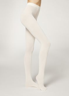 Buy Ribbed Cashmere Blend Tights on our official Calzedonia website. Experience our long history of tradition and quality. Stradivarius Ribbed Leggings, Winter Stocking Leggings, White Wool Leggings, Fitted Cotton Hosiery, Fitted Cotton Hosiery In Solid Color, Fitted Solid Cotton Hosiery, Fitted Ribbed Tights For Fall, Fitted Ribbed Cream Bottoms, Fitted Ribbed Tights For Loungewear