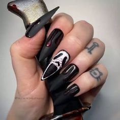 Easy Halloween nails include simple and low-key nail art, such as spider webs, pumpkins, zombies, ghosts, and many other amazing things. Check out our new gallery! #nailart #nailtrends2024 #nailspiration #spookyseason2024 #halloween2024 #halloweennails #halloweennailsdesigns #halloweenmanicure #scaryhalloweennails #gothgirlnails #skullnails #blacknails #lovemynails #naildesignsjournal Matte Black Nail Polish, Halloween Nails Design, Scary Nails, Moon Manicure, Black Coffin Nails