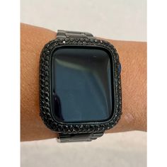 Fits Apple Watch in sizes 38mm 40mm 41mm 42mm 44mm & 45mm Series 1-7 SE. Luxury Black Apple Watch Band Stainless Steel in a new Ultra thin and light design with a butterfly buckle. Can be adjusted to fit wrist sizes from 5" to 8 1/4". Easy to resize and comes with a tool/instructions. You can select the set band+bezel, band only or bezel cover only using the drop down menus. Bezel Cover Add a 38mm 40mm 41mm 42mm 44mm 45mm Black on Black custom 14k Rhodium plated Metal Case Cover Bezel with hand Black Apple Watch, Black Apple Watch Band, Bezel Band, Ceramic Watch, Black Apple, 38mm Apple Watch Band, Black On Black, Rose Gold Band, Light Design