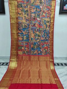 1.THIS IS BEAUTIFUL PURE KANJIVARAM PENKALAMKARI SILK SARI EITH 16 inch BORDER WITH STORIES PAINTING WITH RUNNING BLOUSE PIECE  2.THIS SARI IS 5.5 MT LENGTH 3.THIS IS A VERY ELEGANT LOOKING SARI FOR ALL OCCASIONS LIKE WEDDINGS AND OTHER FORMAL EVENTS  4.FALL N PICO IS COMPLIMENTARY  5.BLOUSE CAN BE MADE AS PER YHE REQUIREMENTS OF THE CLIENTS WITH PROPER MEASUREMENTS.STICHING CHARGES WILL BE EXTRA 6.PLZ CHECK THE AVAILABILITY OF THE SARI BEFORE PLACING THE ORDER Anarkali Style Saree In Art Silk With Kalamkari Print, Red Raw Silk Traditional Wear With Kalamkari Print, Traditional Silk Wear With Kalamkari Print, Wedding Dupatta With Kalamkari Print In Raw Silk, Wedding Dupatta With Kalamkari Print On Raw Silk, Traditional Raw Silk Saree With Kalamkari Print, Red Raw Silk Dupatta With Kalamkari Print, Raw Silk Kalamkari Dupatta For Traditional Ceremonies, Festive Kalamkari Print On Paithani Silk Traditional Wear