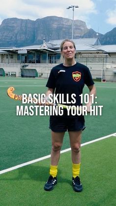 a woman standing on top of a soccer field with her hands behind her back and the words basic skills 101 mastering your hit