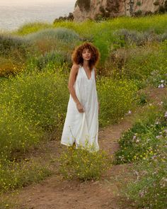 Introducing our? classic white dress with a halter neck, made from fine handwoven cotton. This exquisite dress is perfect for those sunny days at the beach. Crafted with attention to detail, this dress combines comfort and style seamlessly. Fit to true size. Falls 47" from high point of shoulder. Sleeveless. Deep back. Made with Hand-woven cotton.? Sustainably made. Machine wash. White Cotton Halter Neck Maxi Dress, Summer Cotton Halter Dress For Vacation, White Cotton Beach Midi Dress, White Linen Midi Dress For The Beach, Cotton Halter Sundress For Beach, Summer Cotton Halter Dress For Beach, Cotton Halter Beach Dress, Cotton Halter Dress For The Beach, White Halter Neck Dress For Beach