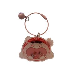 an animal shaped key chain hanging from a hook