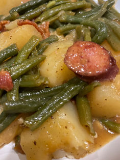 green beans recipe Easy Smothered Green Beans, Smoked Sausage Green Beans Potatoes, Smothered Green Beans With Sausage, Green Beans Sausage Potatoes Crock Pot, Green Bean Potatoes And Sausage Crockpot, Portuguese Green Beans And Linguica, Potato Sausage And Green Beans, How To Cook Andouille Sausage, Potatoes Green Beans And Sausage